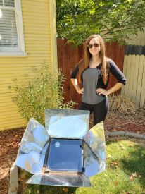 Morgan Stonefelt with a solar cooker