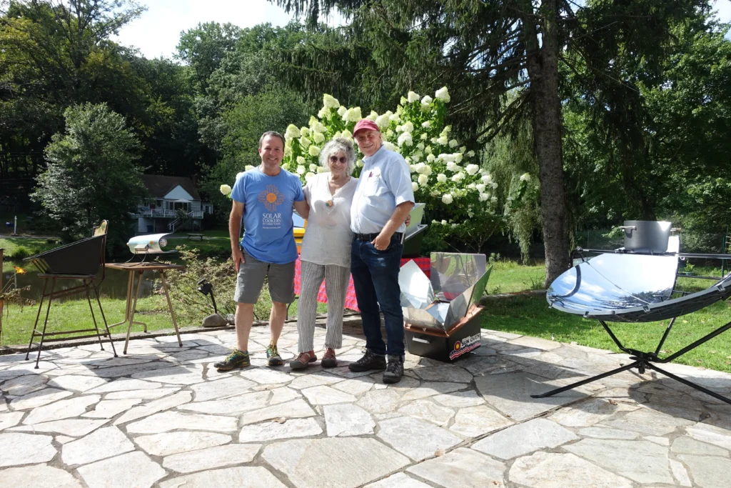 Solar cooking demonstration in New York showing sustainable cooking with sunlight technology