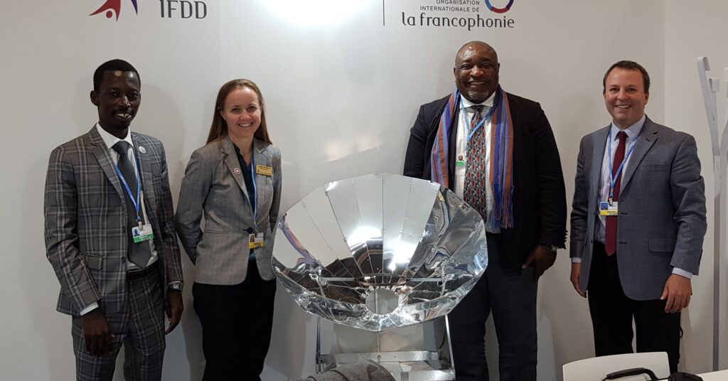 SCI Representative Rob Tyrrell promoting solar cooking at COP25 in Madrid, Spain