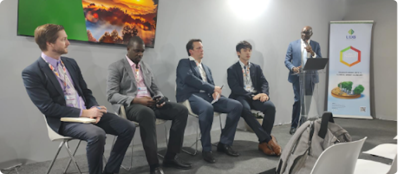SCI representatives and partners discussing clean energy financing solutions