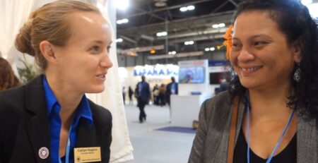 SCI Executive Director Caitlyn Hughes discussing solar cooking adoption with Marshall Islands Energy Planner at COP25