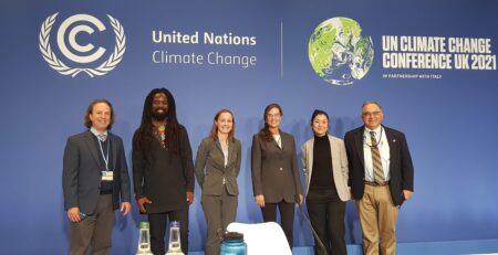 SCI Executive Director Caitlyn Hughes speaking at COP26 Global Warming Mitigation Project press conference