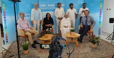 SCI panel discussion at COP28 sharing climate solutions and solar cooking innovations