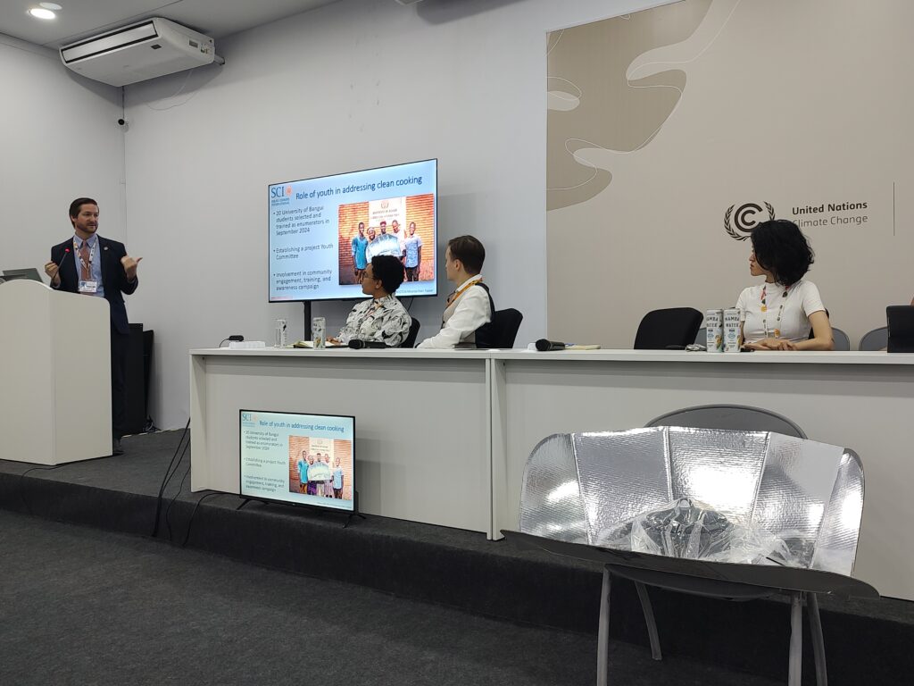 Speakers presenting community-based solar cooking solutions at COP30