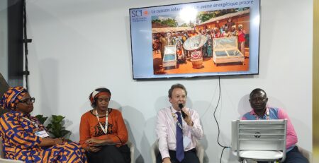 SCI representatives presenting affordable solar cooker production initiatives for the Central African Republic at COP30