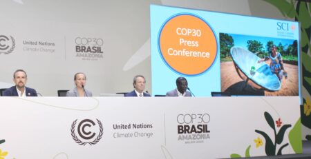 SCI representatives and global partners speaking at a COP30 press conference on solar cooking solutions