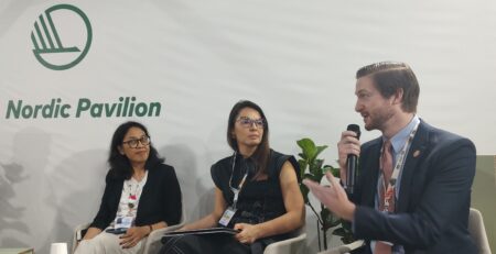 SCI representatives participating in a COP30 panel on locally led solar technology and climate security