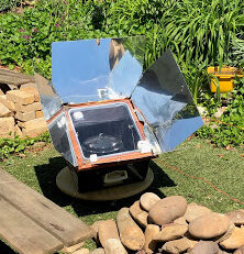 SCI Board Member Dr. Peg Barratt sharing solar cooking recipes and tips for homemade solar bread