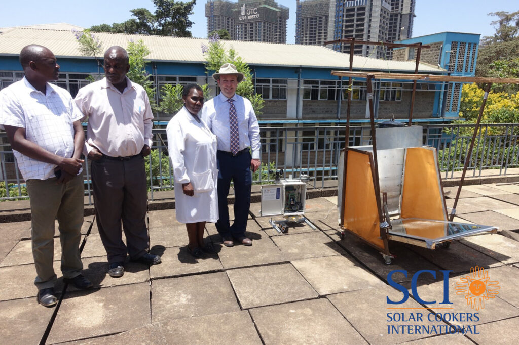 Solar cooker demonstration showing clean cooking technology for families in Kakuma Refugee Camp