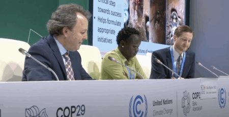SCI representatives and Grace Dorong speaking about gender and solar cooking at a COP29 press conference
