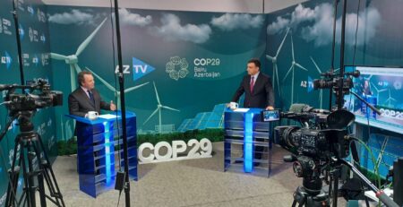 Alan Bigelow being interviewed by AZTV during the United Nations Climate Change Conference (COP29) in Baku, Azerbaijan