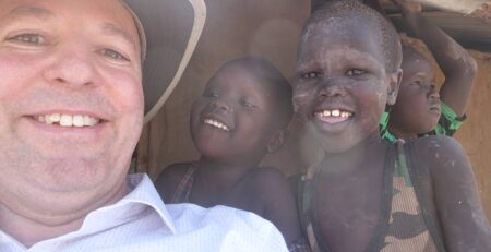SCI Science Director Alan Bigelow documenting solar cooking initiatives during his visit to Kakuma Refugee Camp in Kenya