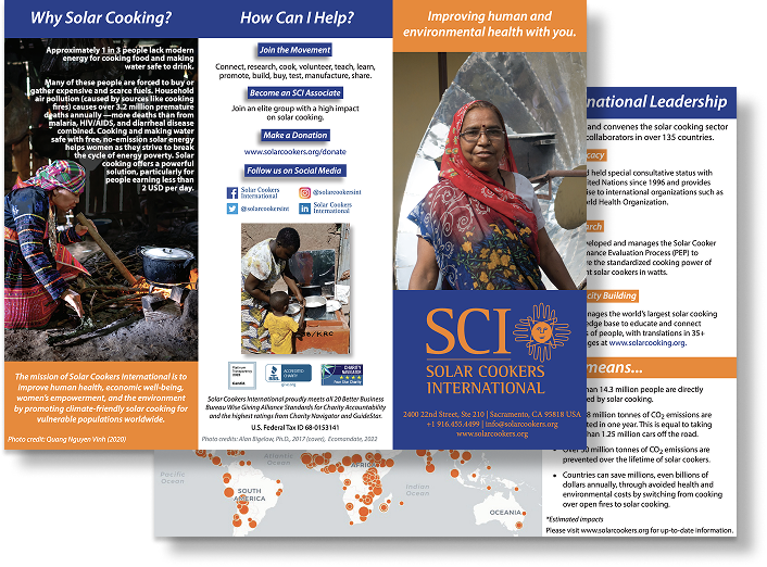 People sharing information about Solar Cooking International's clean cooking mission