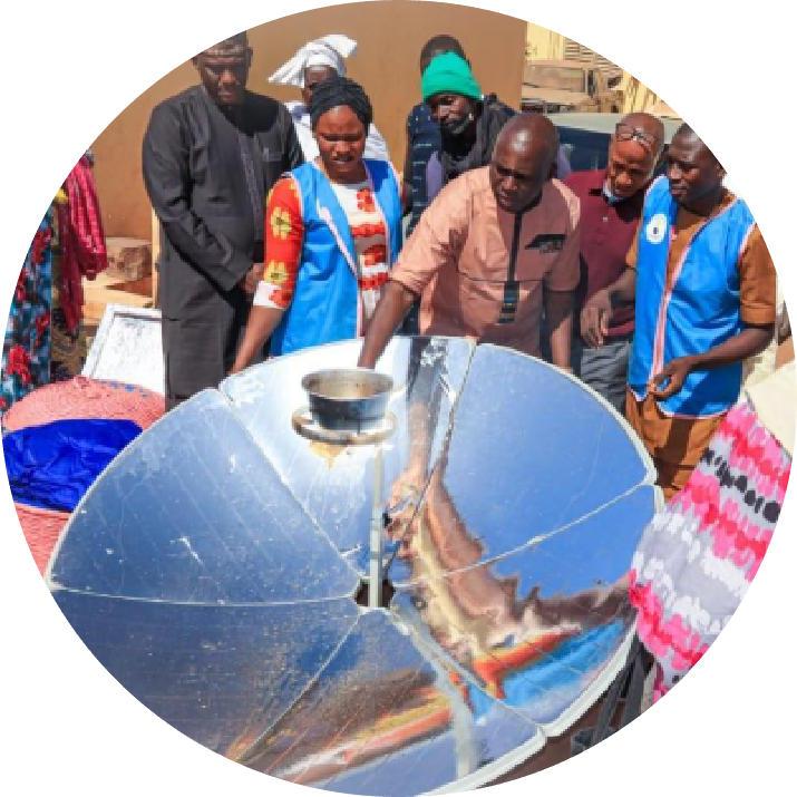 Locally manufactured solar cookers displayed for use in Malian communities