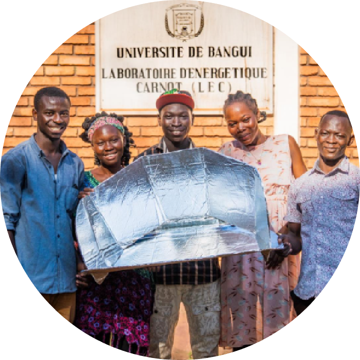 University students designing and testing solar cookers